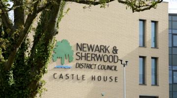 Front of Castle House with the Newark and Sherwood logo on the side of the wall