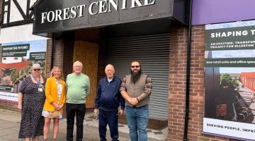 Karen Wakefield - Town Clerk, District Councillor Clare Penney, Cllr Derek Batey - Town Council, Cllr Ray Shilling - Town Council, Cllr Lee Brazier - District Councillor and Town Mayor standing in front of the area which will be developed in Ollerton